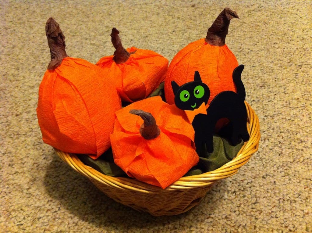 Tasty treats await inside the pumpkin crepe paper!